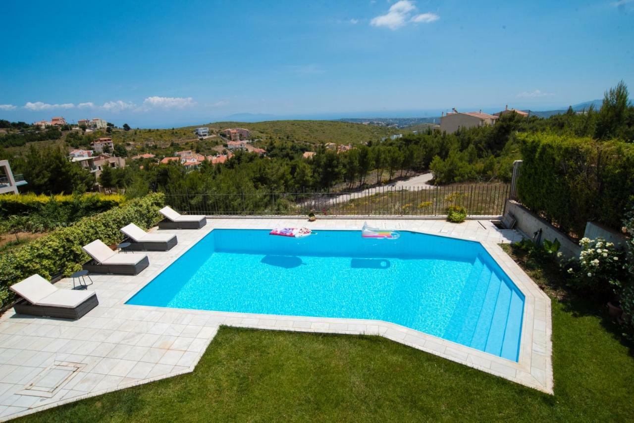 Villa Olympia Vip Dhráfi Buitenkant foto